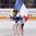ST. CATHARINES, CANADA - JANUARY 12: A young minor hockey player skates out with the France country flag during the pre-game ceremony prior to Switzerland vs France relegation round action at the 2016 IIHF Ice Hockey U18 Women's World Championship. (Photo by Jana Chytilova/HHOF-IIHF Images)

